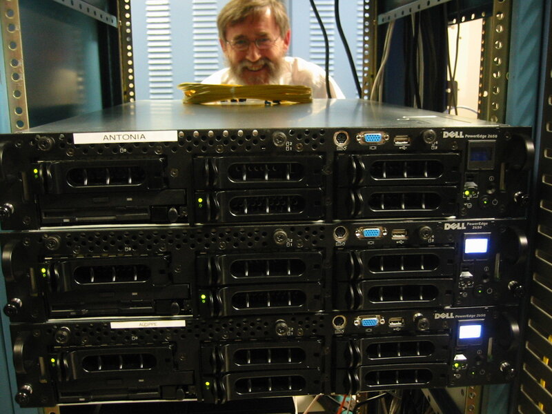 Man behind server rack