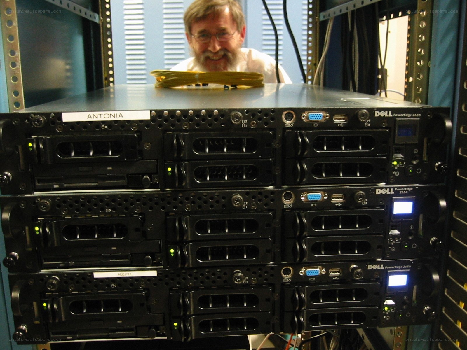 Man behind server rack