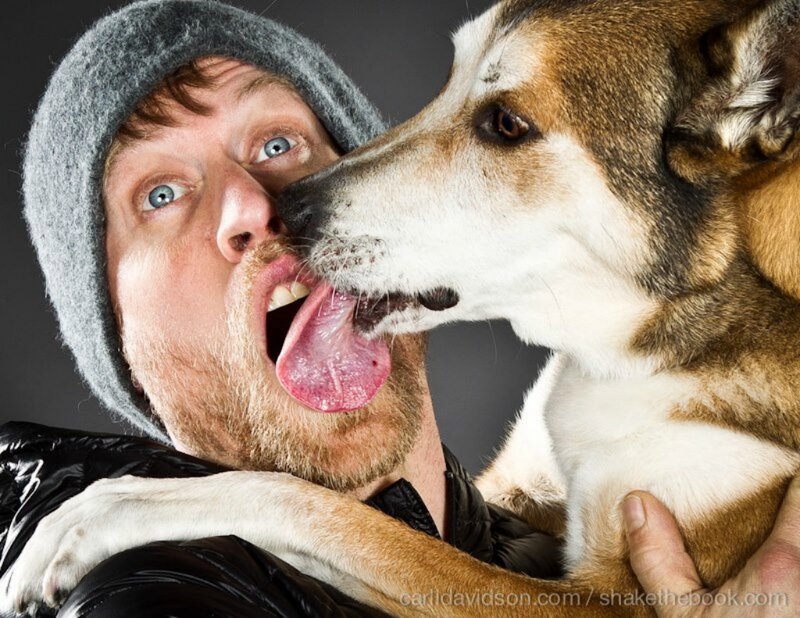 Man Being Licked by Dog