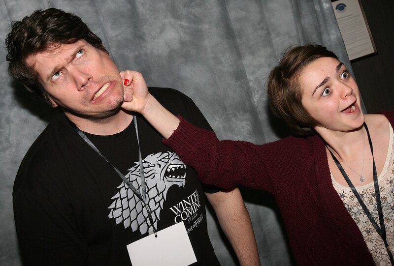 Man being playfully choked by woman