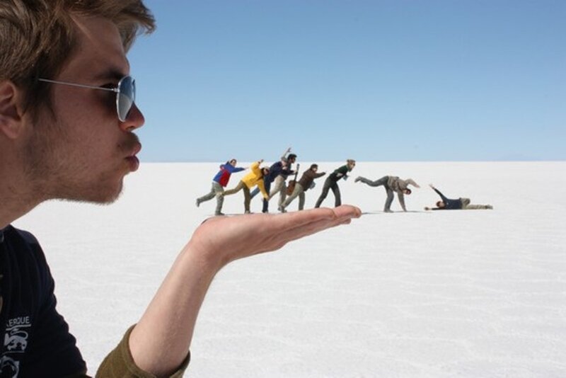Man Blowing Miniature People