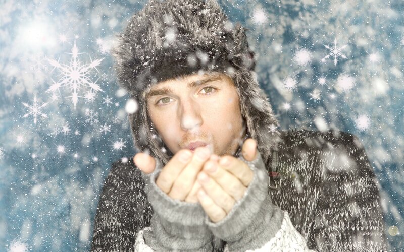 Man Blowing Snowflakes — Blue