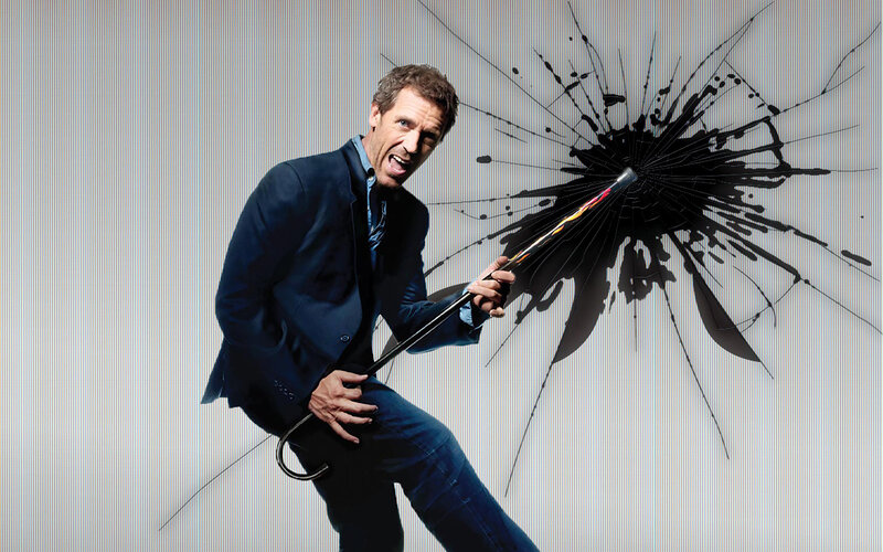 Man breaking glass with umbrella