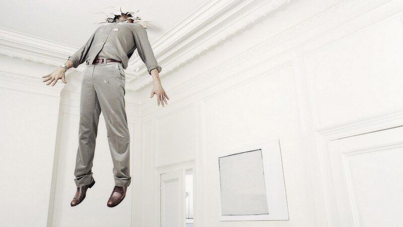 Man breaking through ceiling