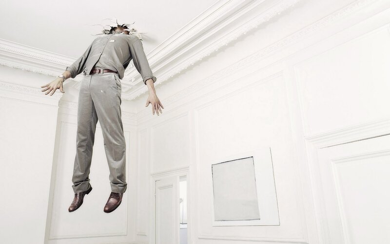 Man Breaking Through Ceiling — White