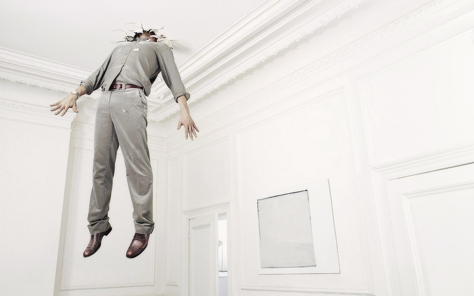 Man breaking through ceiling