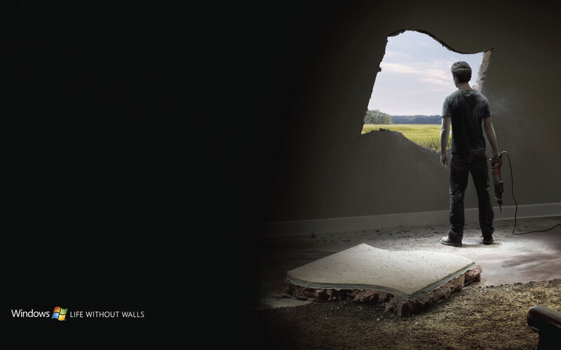 man breaking through wall