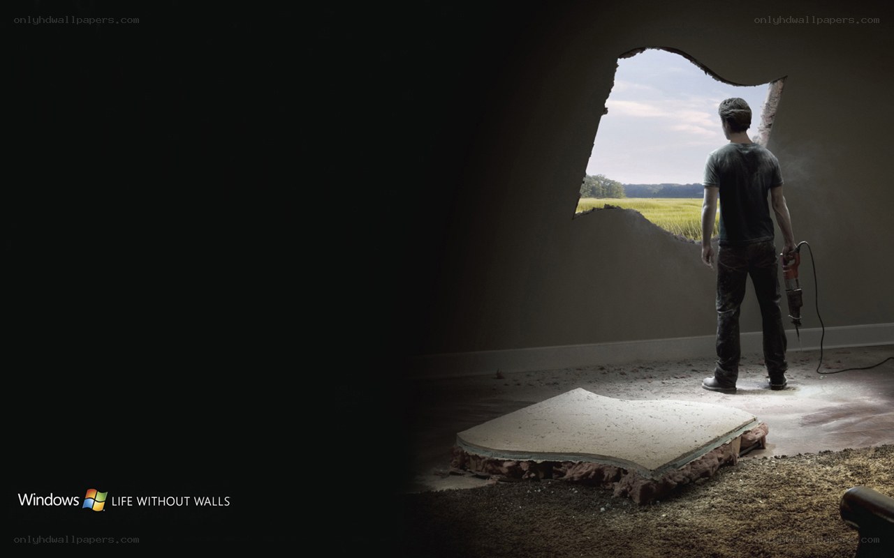 man breaking through wall