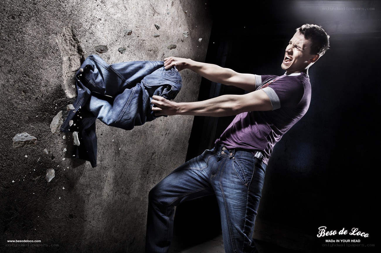 Man breaking through wall