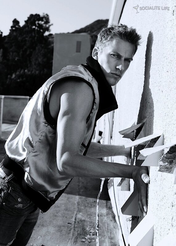 man breaking wall