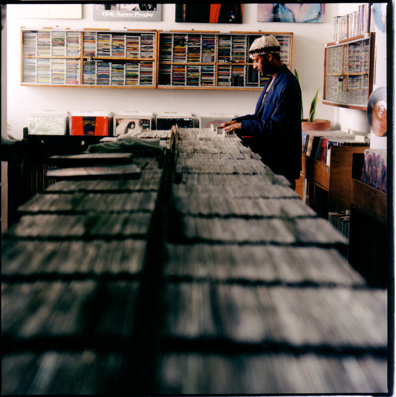 Man browsing records in a store