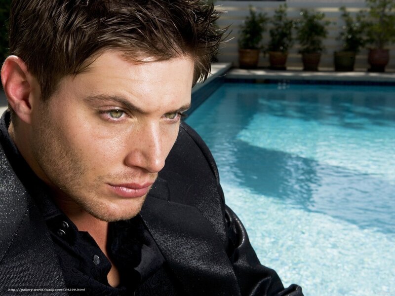 man by poolside