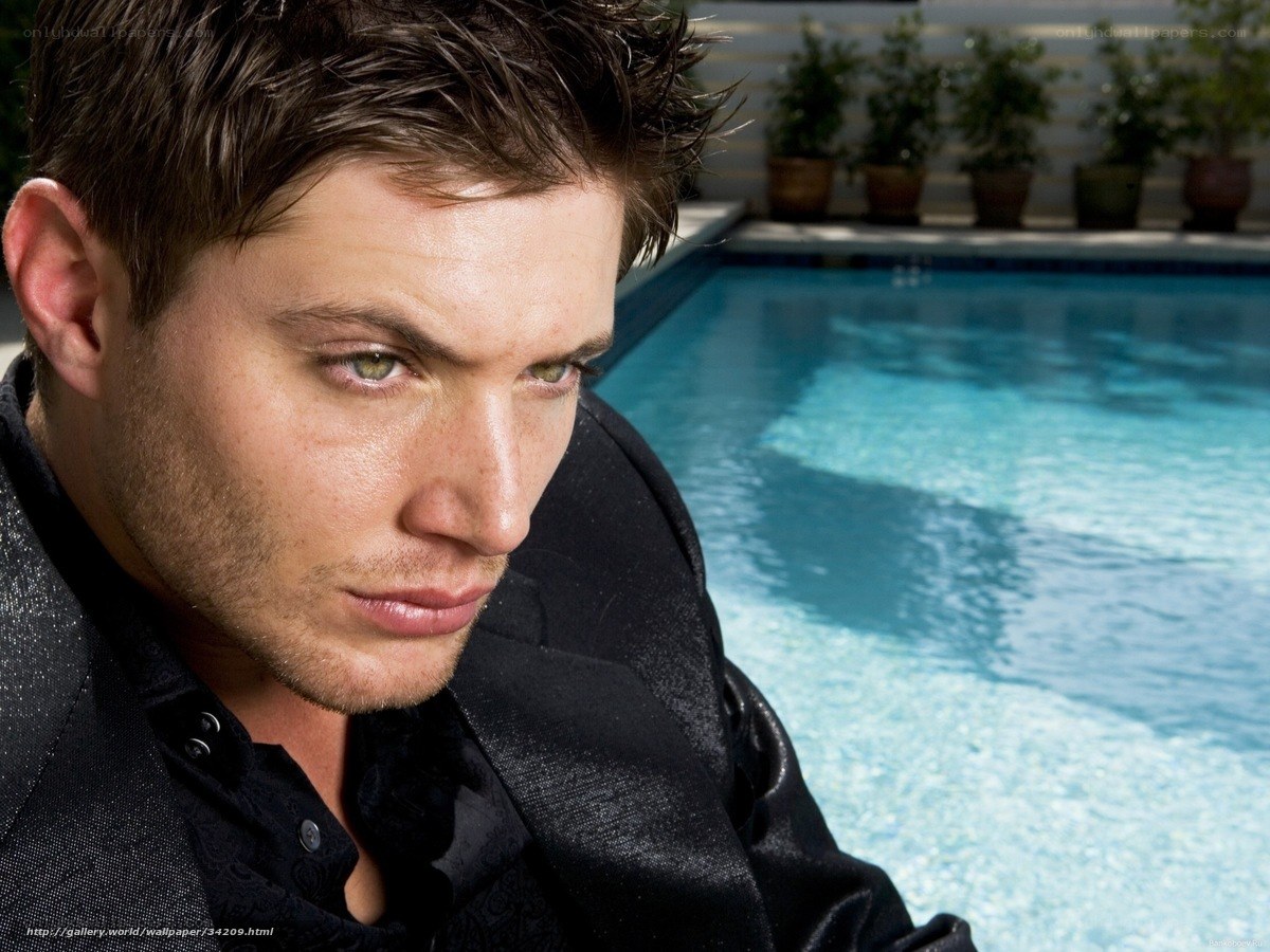man by poolside
