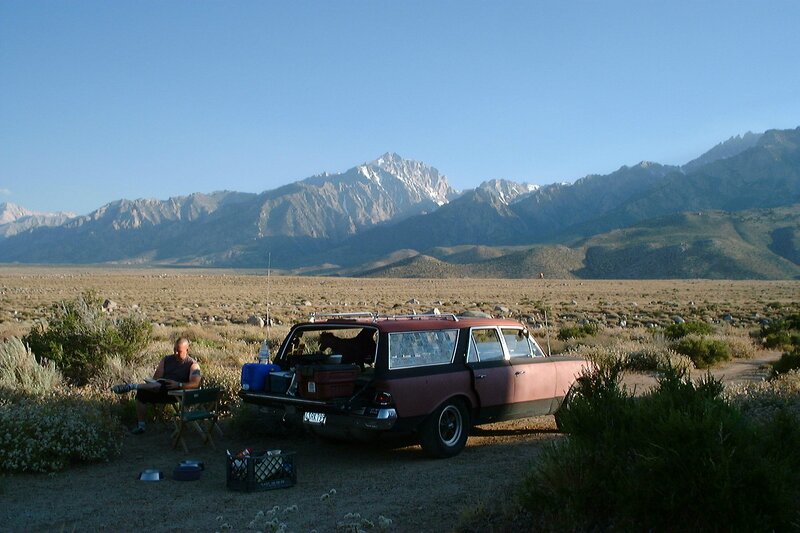 Man Camping in Desert