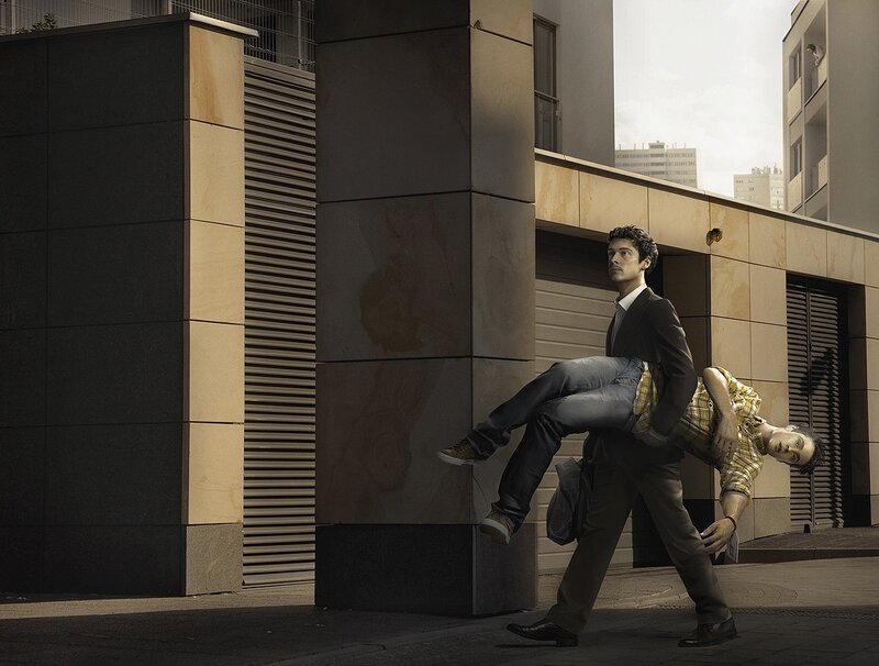 Man carrying another man