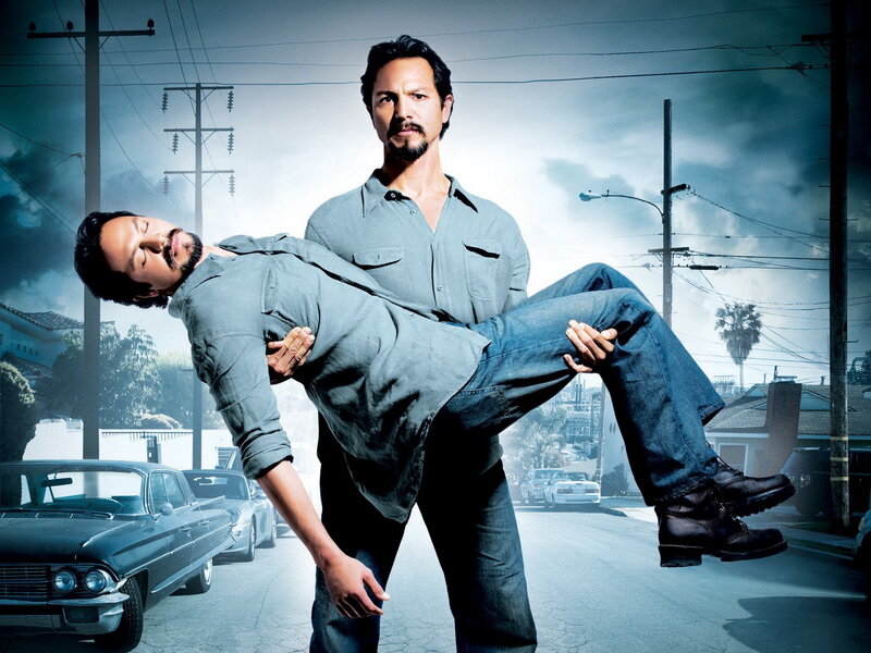 Man Carrying Another Man — Blue