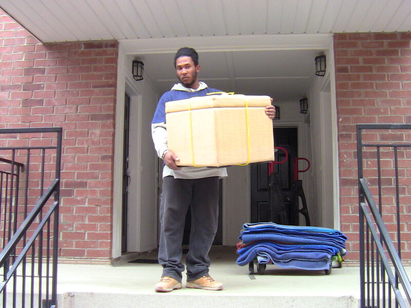 Man Carrying Box