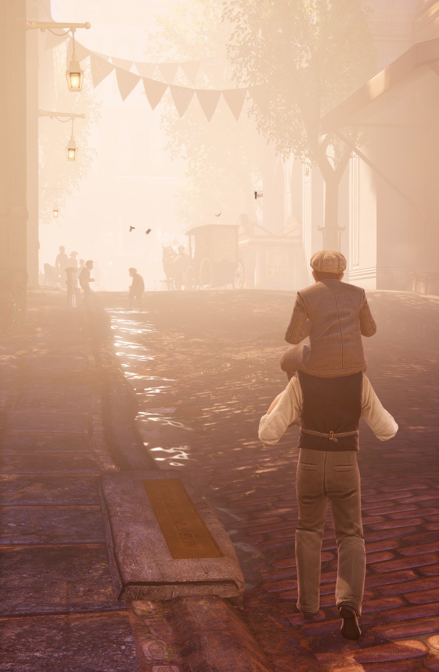 man carrying child on street