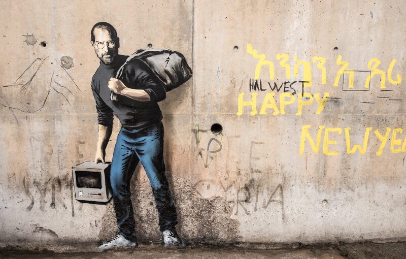 Man Carrying Computer