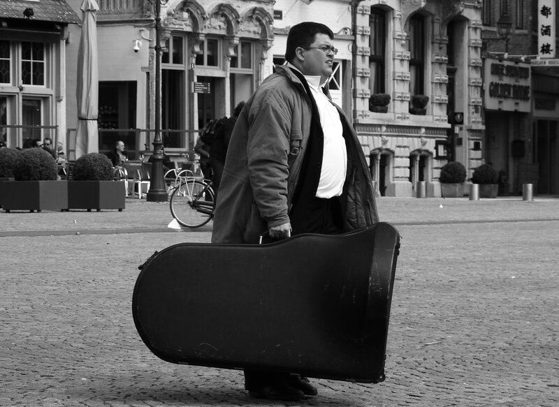 Man carrying instrument case