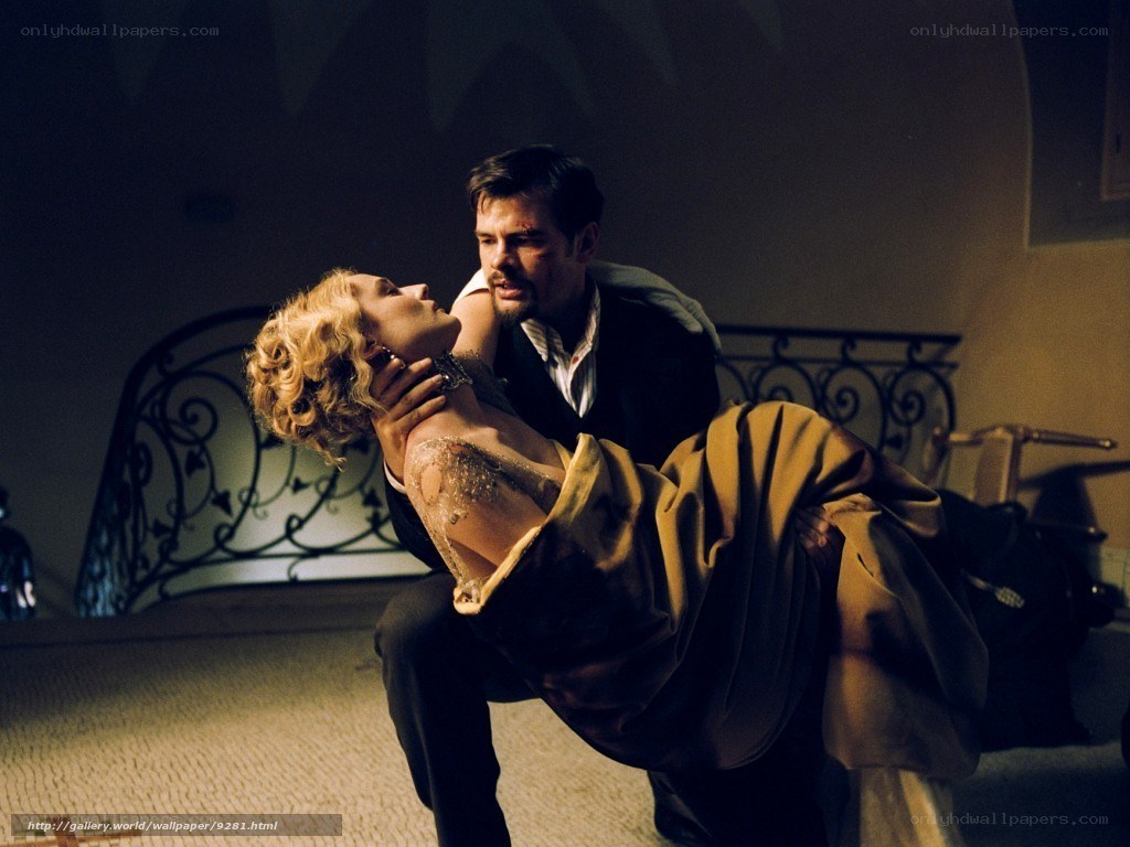 Man carrying woman in distress