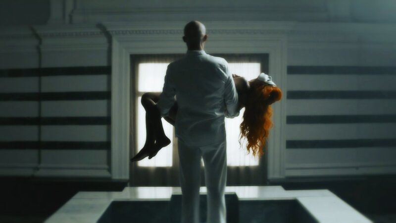 Man Carrying Woman — White, Dramatic, Photograph