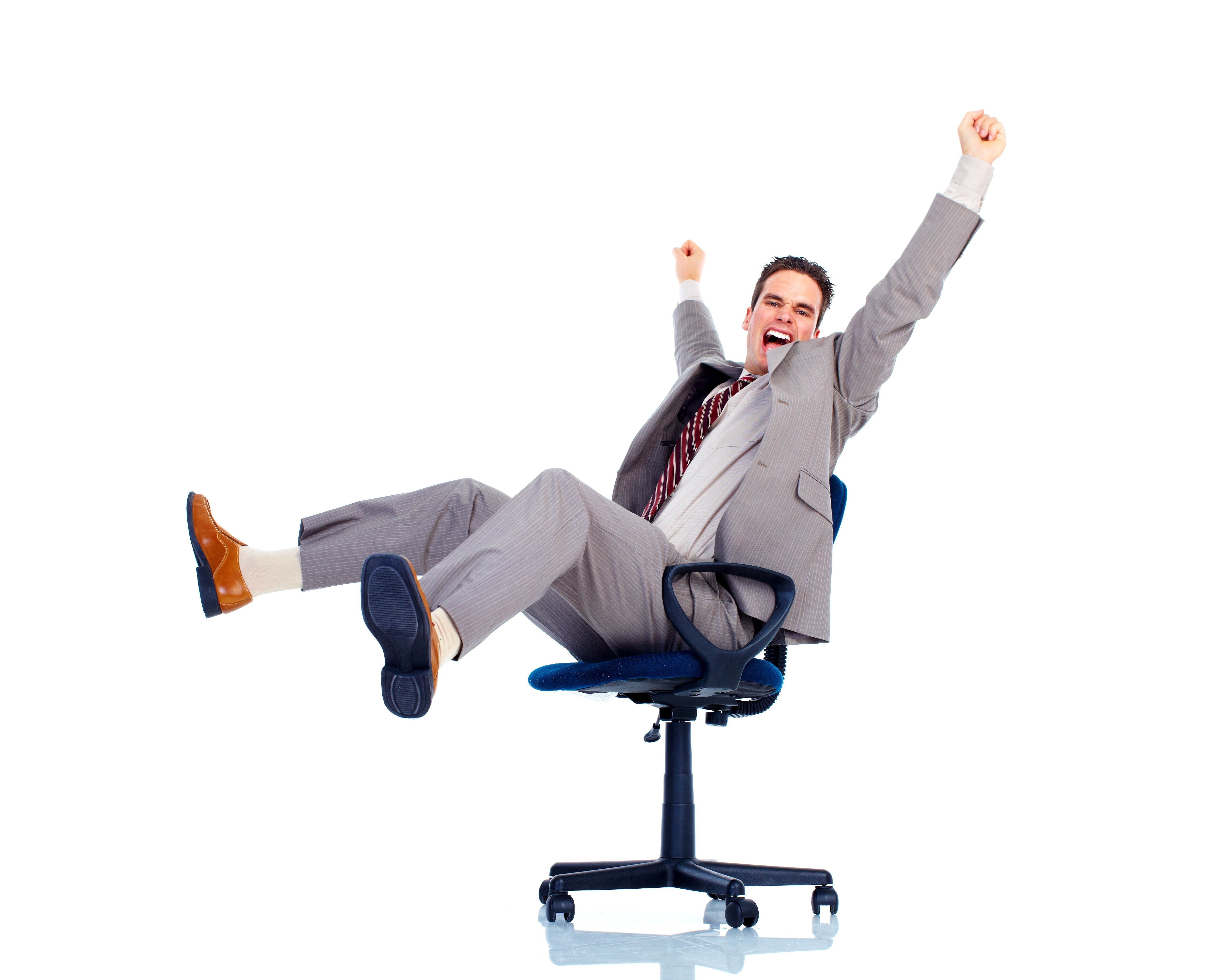 man celebrating in office chair