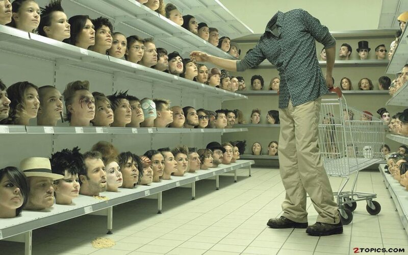 Man Choosing Heads in Store