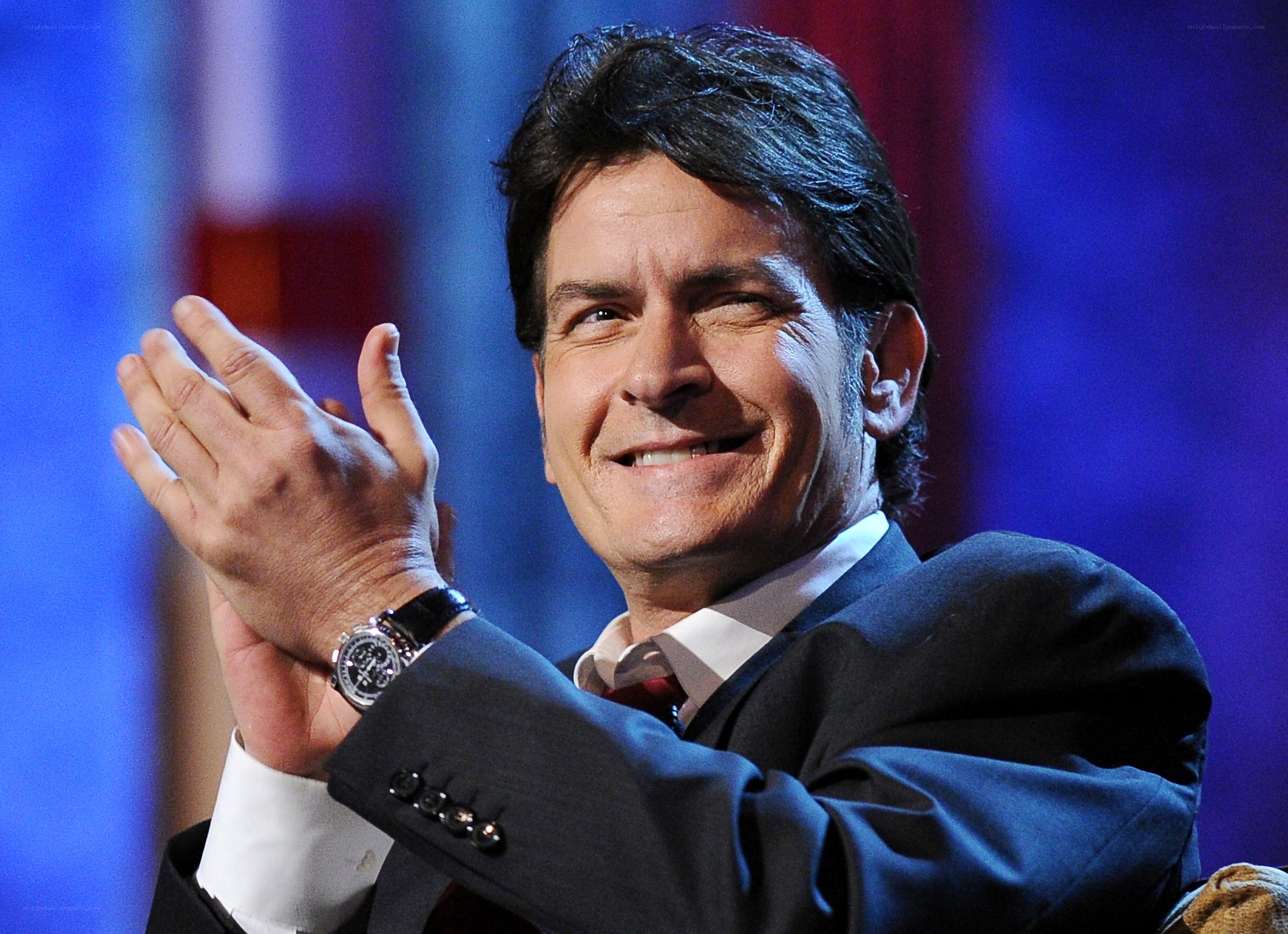 man clapping at event