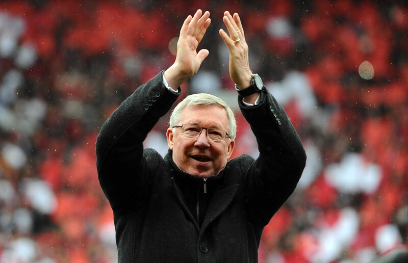 man clapping at stadium