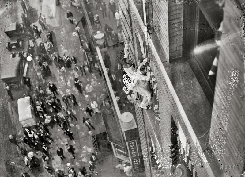 Man climbing building facade