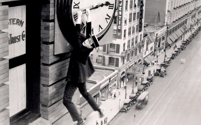 Man Climbing Clock Face — Black