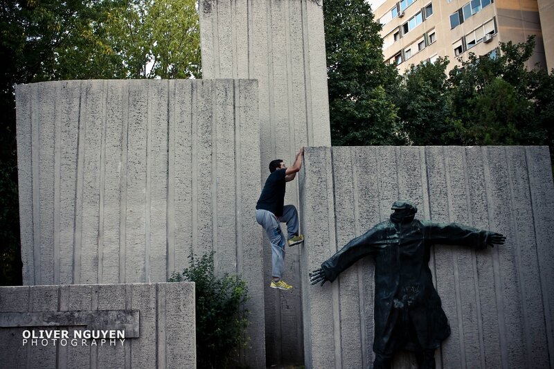 Man climbing concrete wall