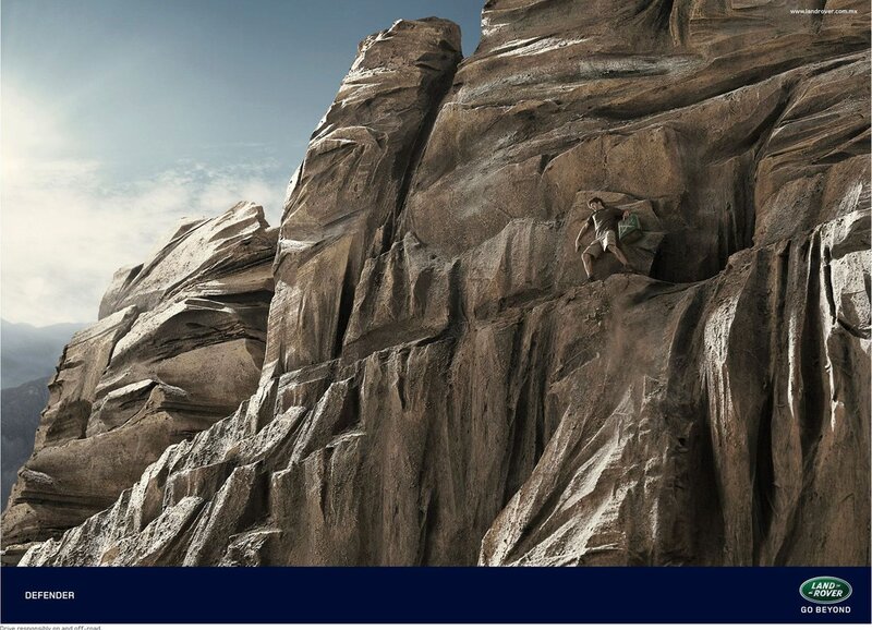 Man Climbing Rock Face — Brown