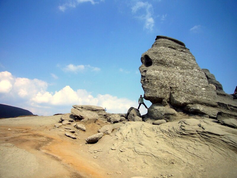 Man climbing rock formation