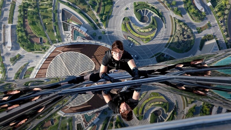 Man Climbing Skyscraper — Black, Dramatic, Afternoon, Photograph, Road