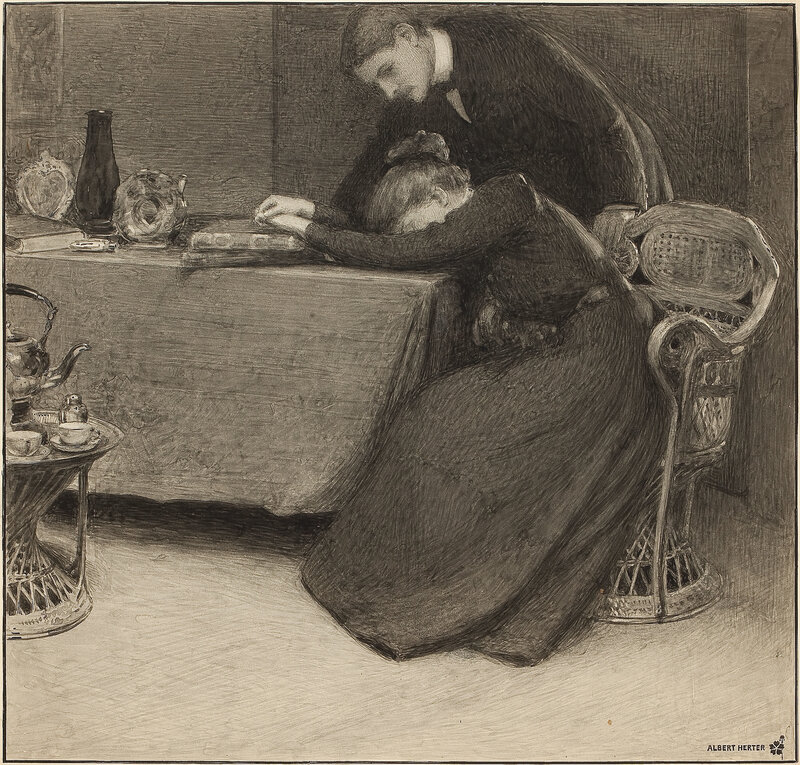 Man comforting a woman at a table