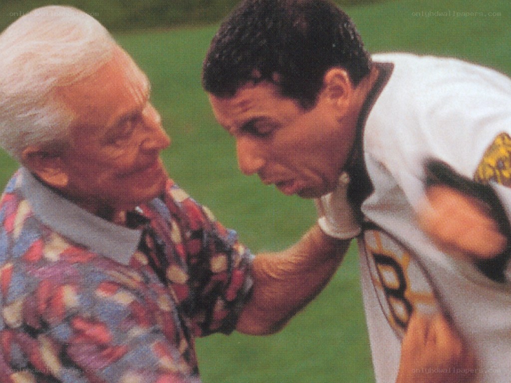 Man comforting hockey player