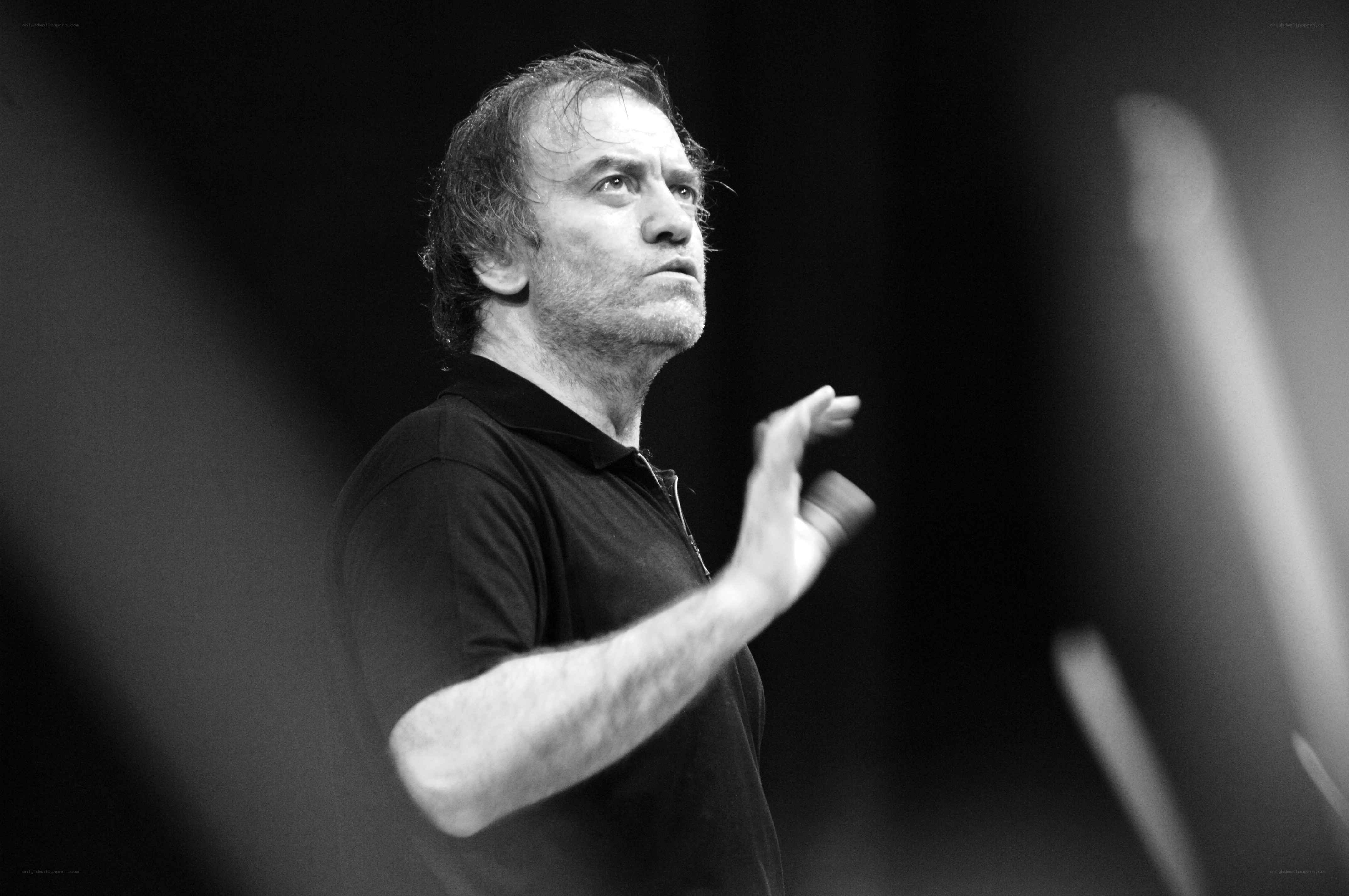 man conducting music