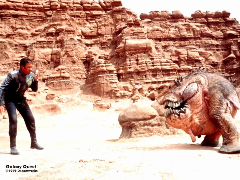 Man confronts alien creature