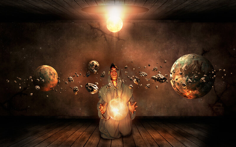man conjuring celestial bodies