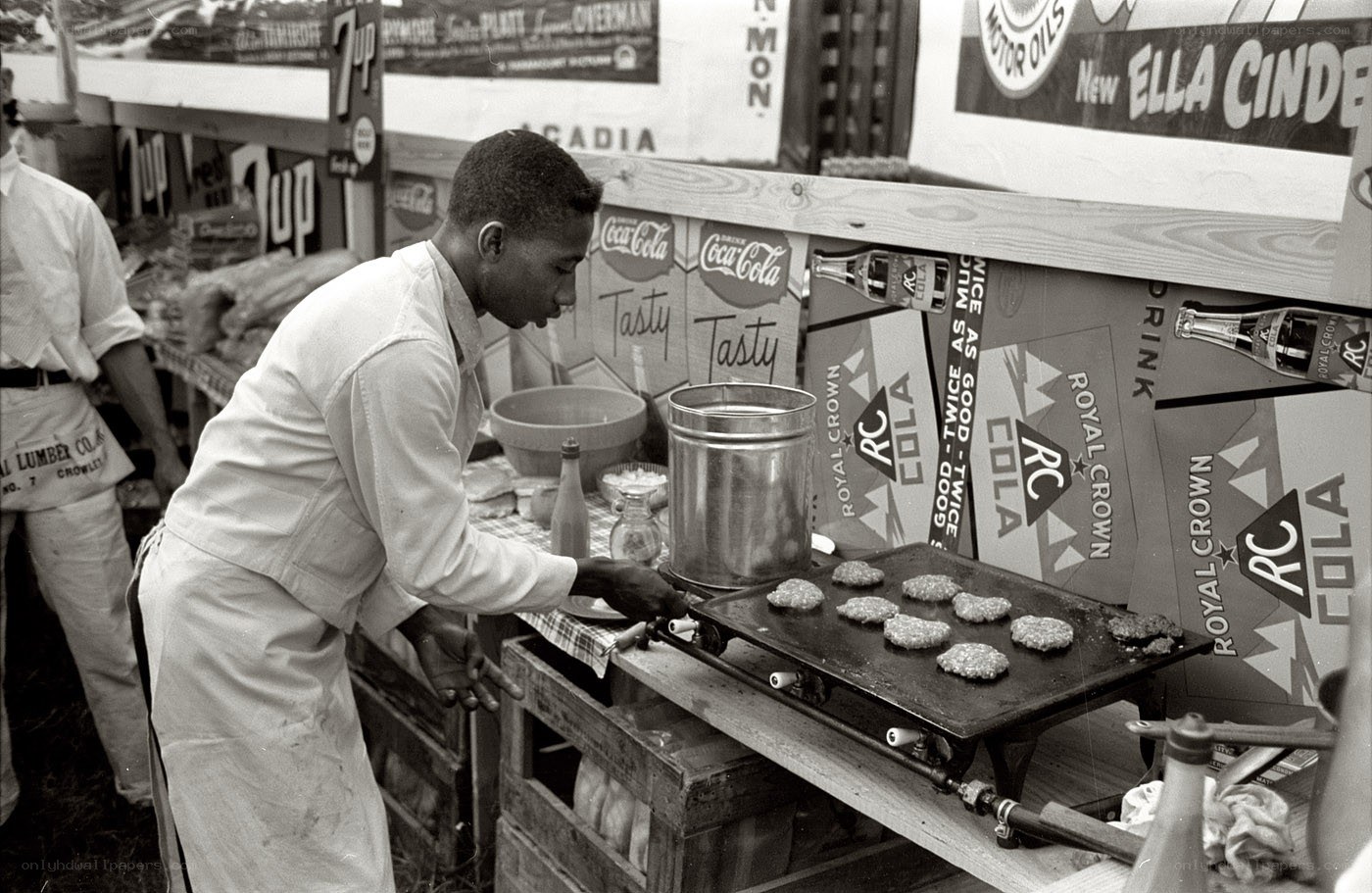 Man cooking at a food stand