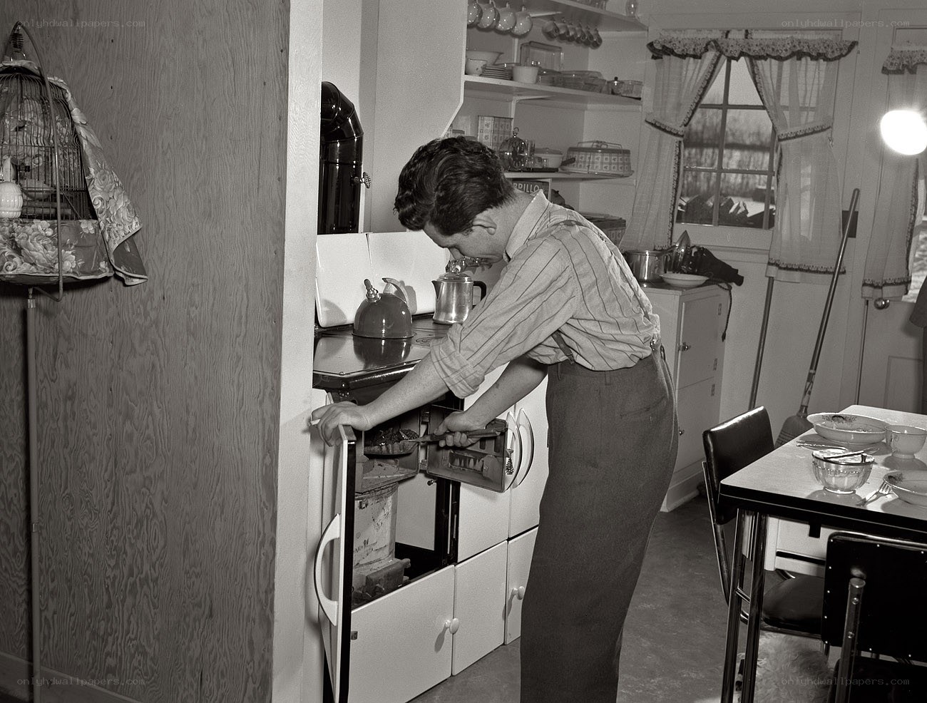 Man cooking in vintage kitchen