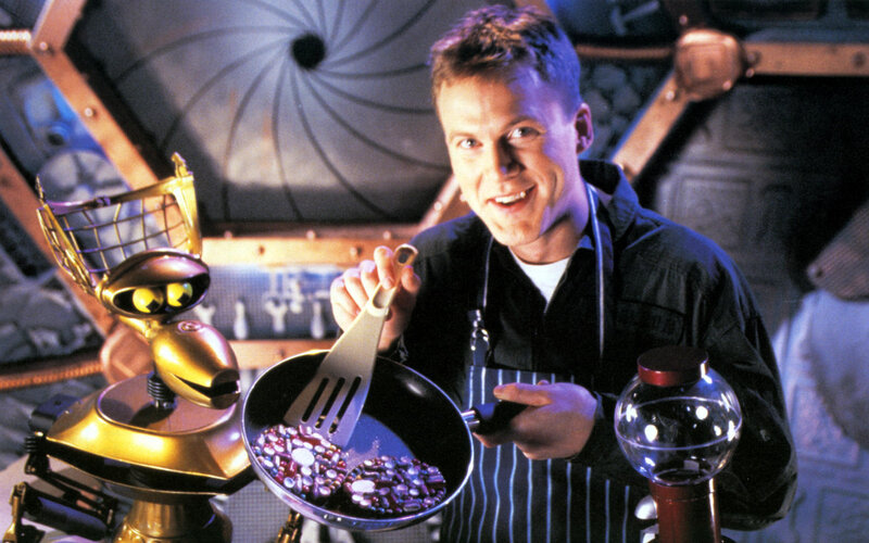 Man cooking with robot