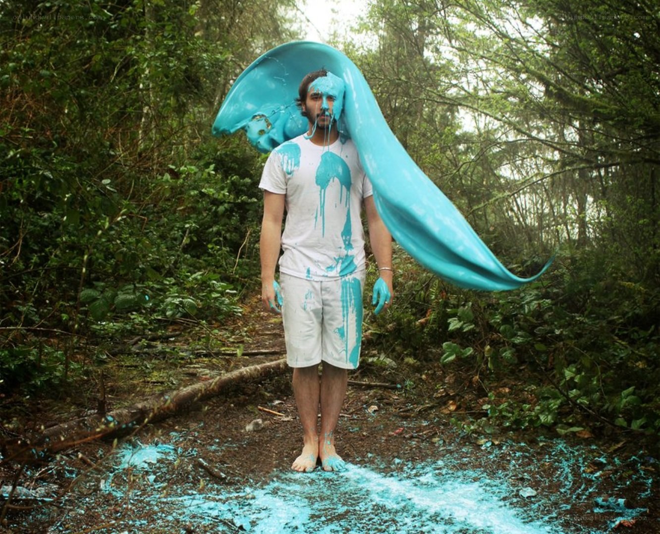 Man covered in blue paint