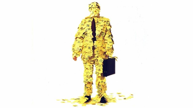 man covered in sticky notes