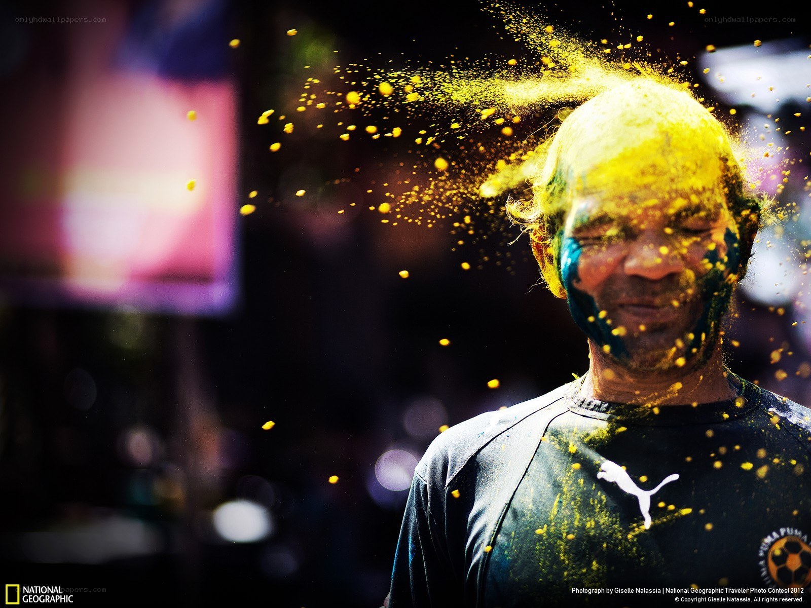 Man covered in yellow powder