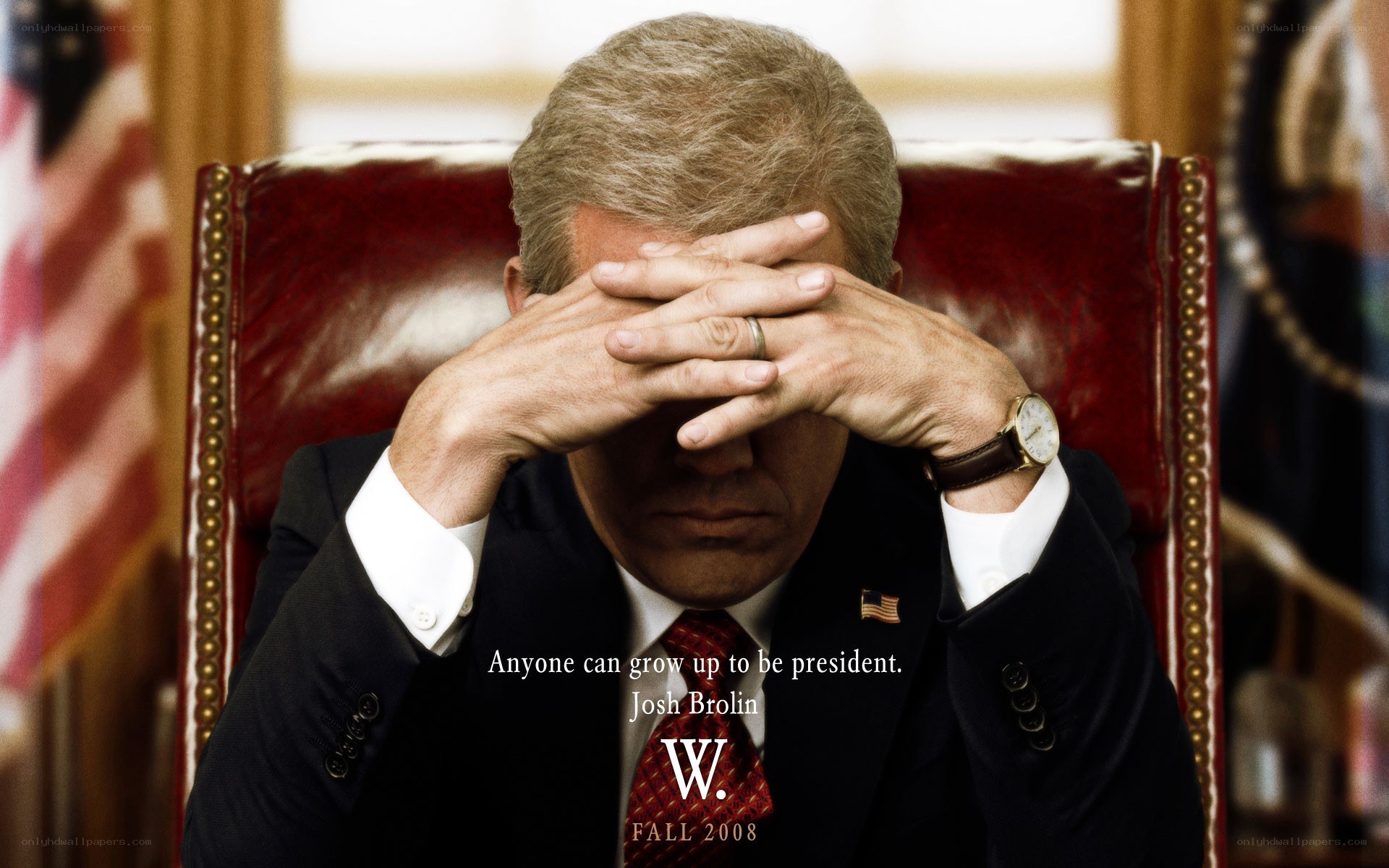 man covering face in office