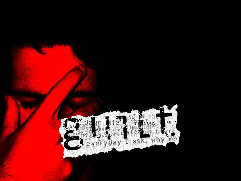 Man Covering Face — Red