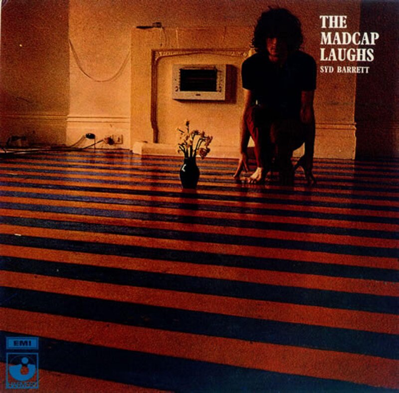 Man Crouching on Floor
